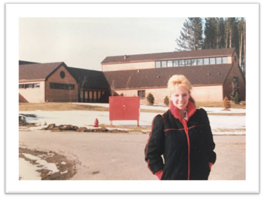 Helen in front of juvenile correctional facility in the winter